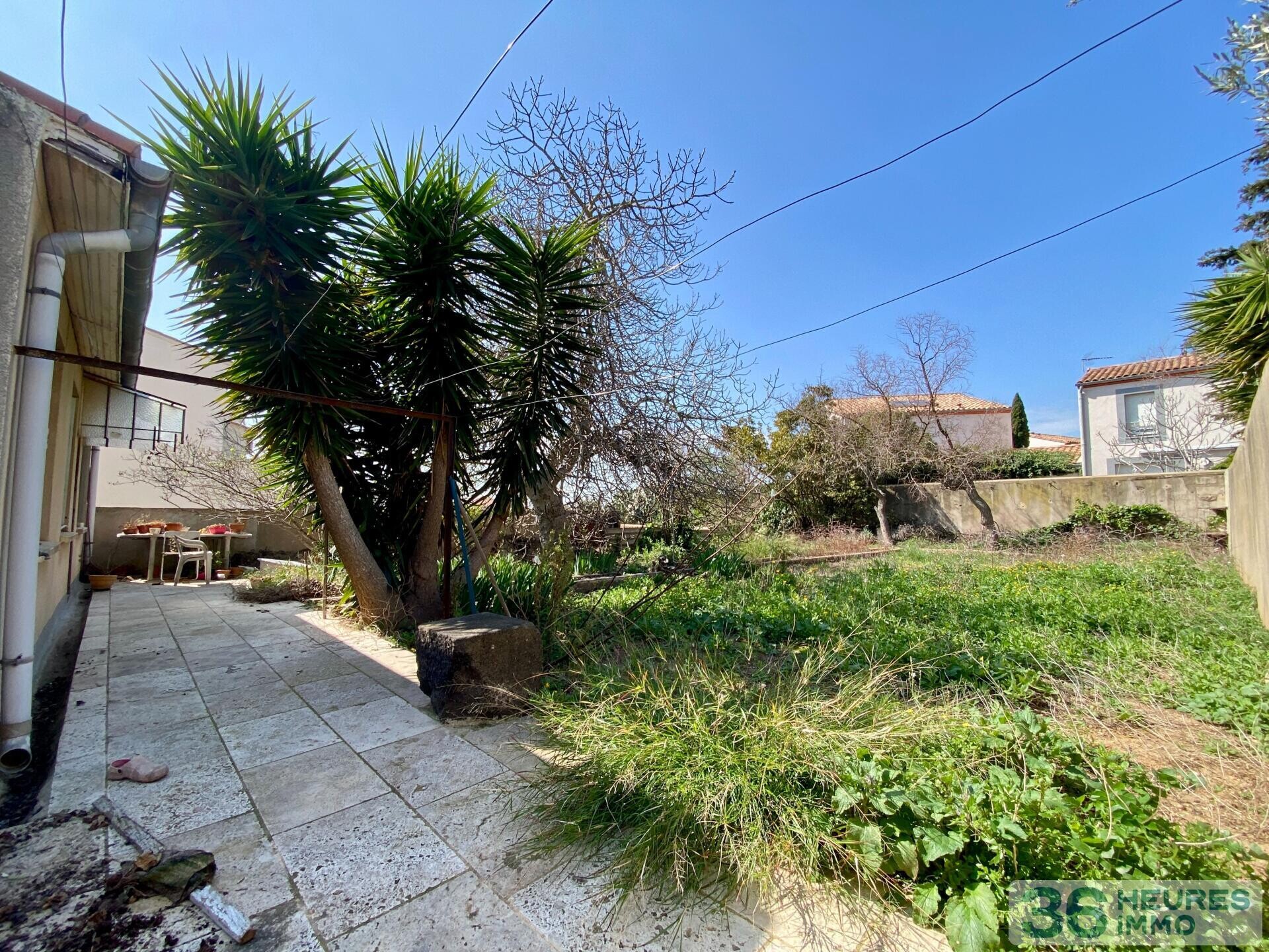 Immeuble à rénover 5 apt + terrain constructible