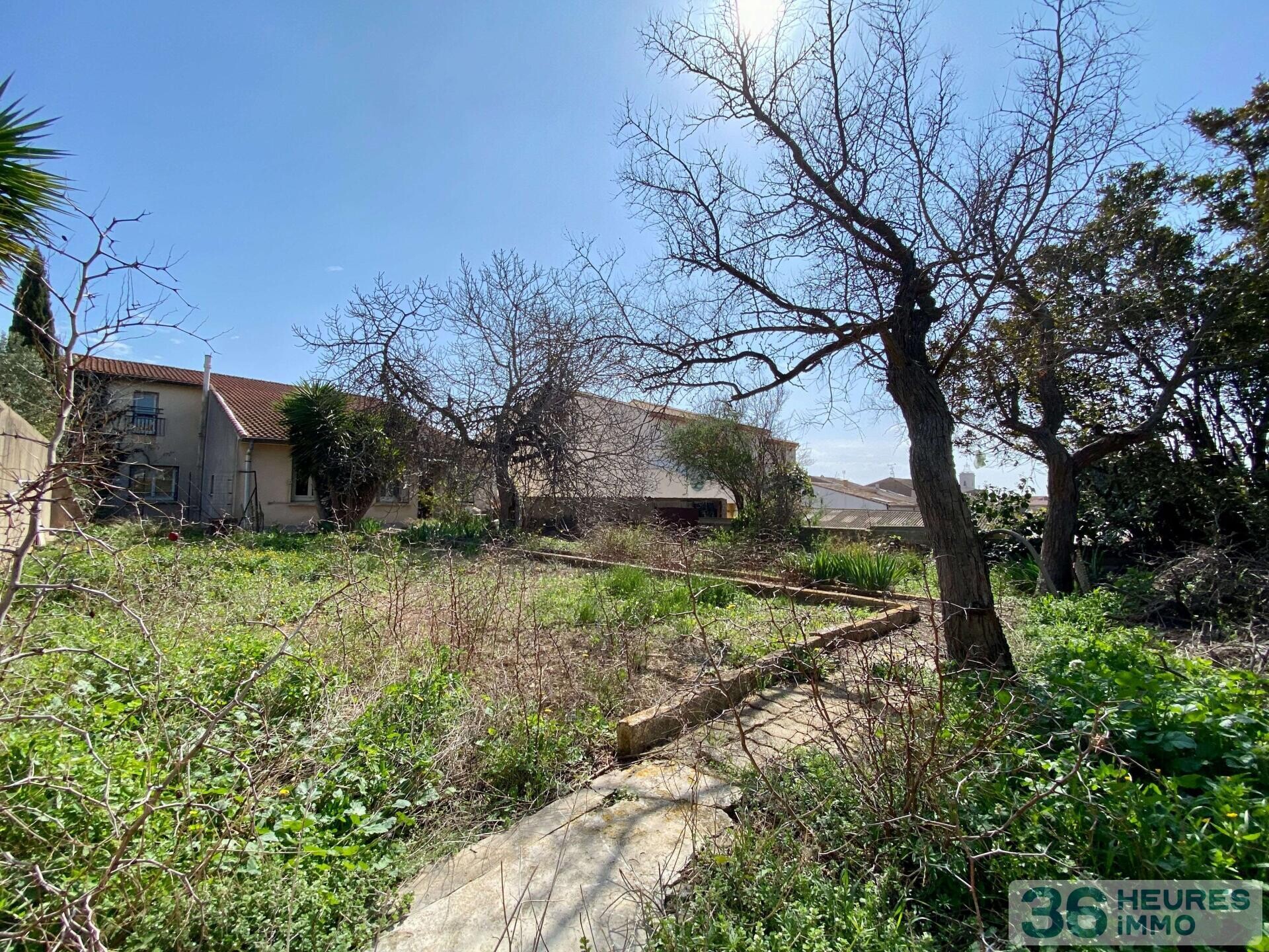 Immeuble à rénover 5 apt + terrain constructible