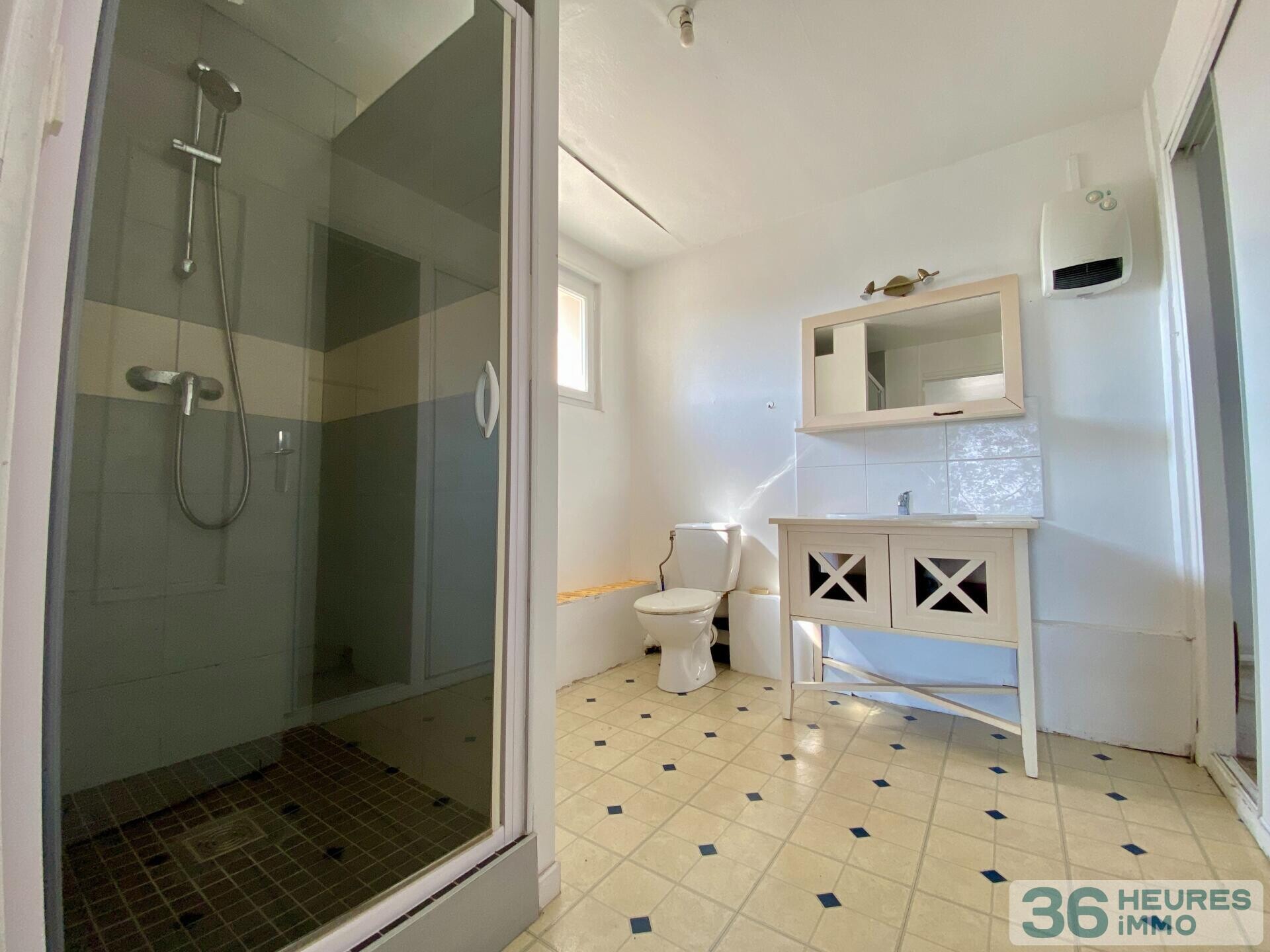 Immeuble à rénover 5 apt + terrain constructible