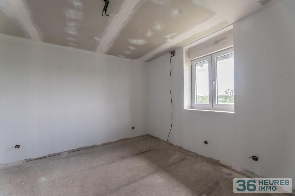 Immeuble de rapport à achever (corps d'état secondaires)