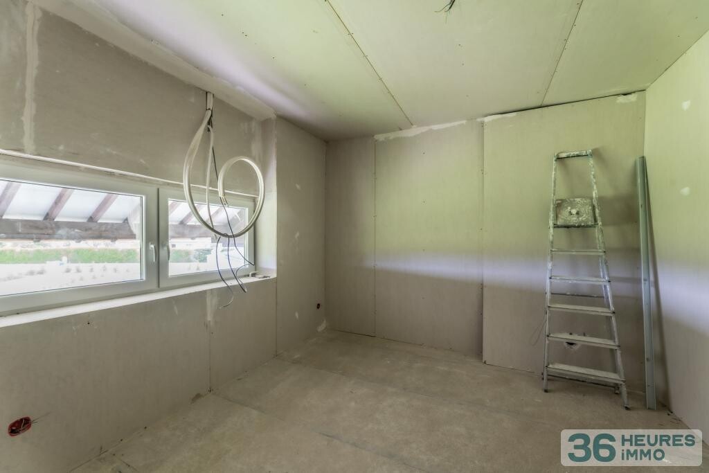 Immeuble de rapport à achever (corps d'état secondaires)