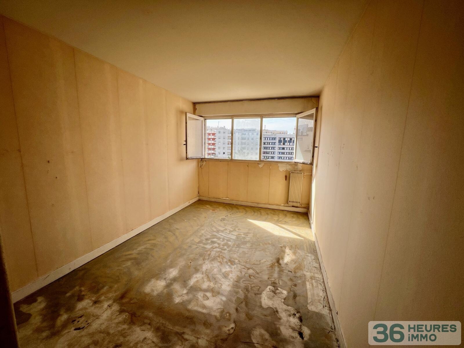 Quartier Coeur de Ville - 3 Pièces à rénover avec balcon + cave + parking + box