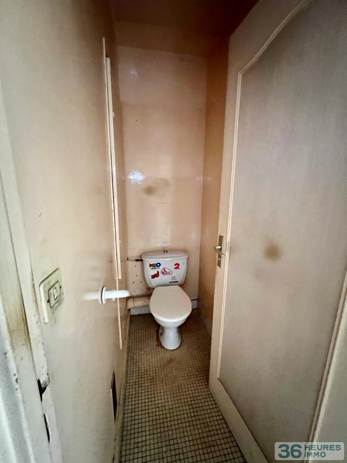 Quartier Coeur de Ville - 3 Pièces à rénover avec balcon + cave + parking + box