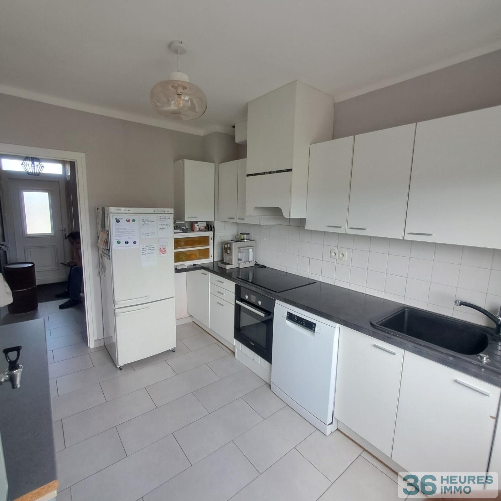 QUARTIER PREMARTINE - RUE CALME - SEMI MITOYENNE - 3 CHAMBRES - JARDIN ET GARAGE 