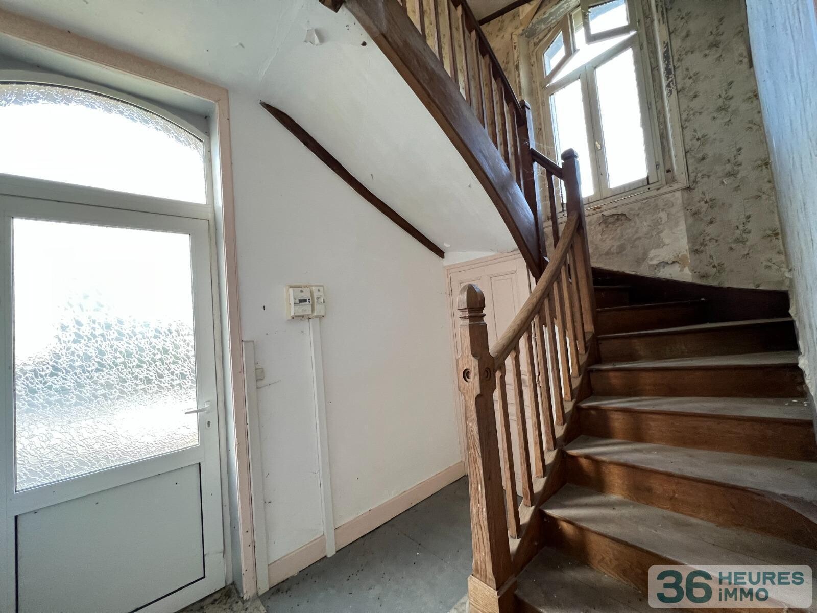 Maison divisée en 3 lots