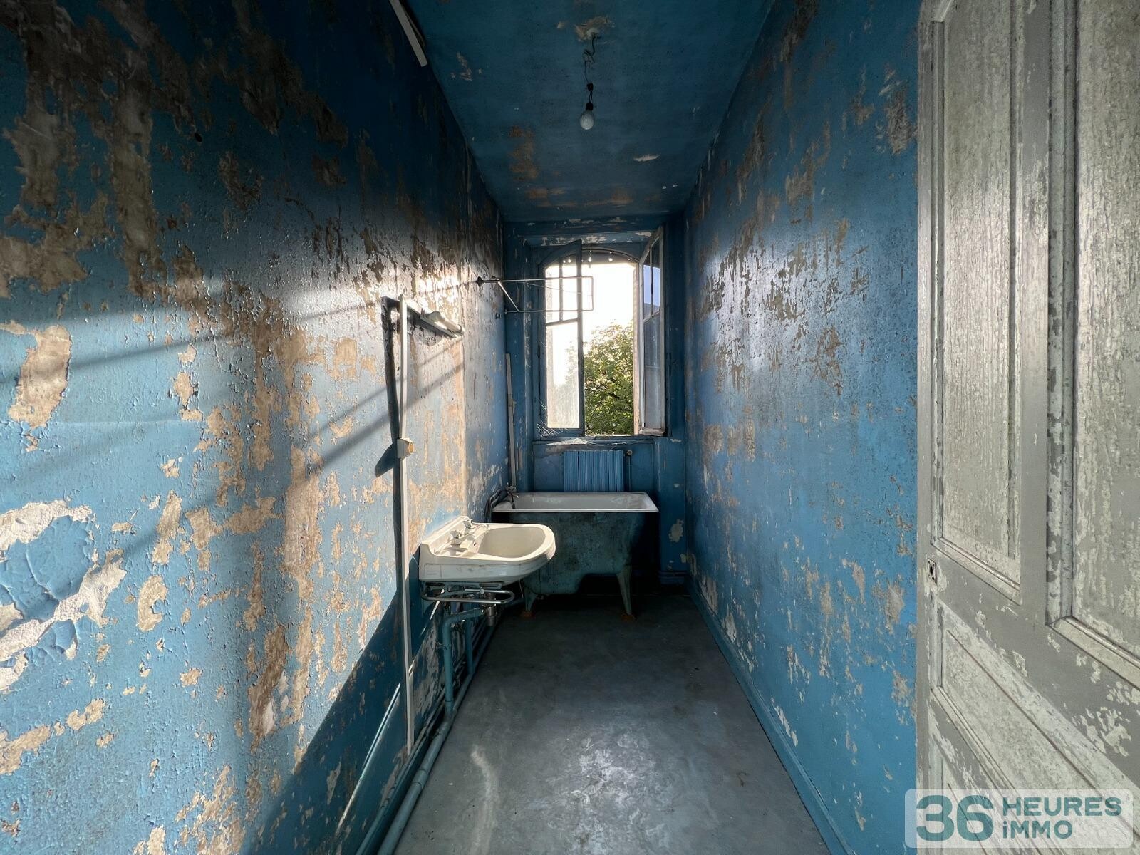 Maison divisée en 3 lots