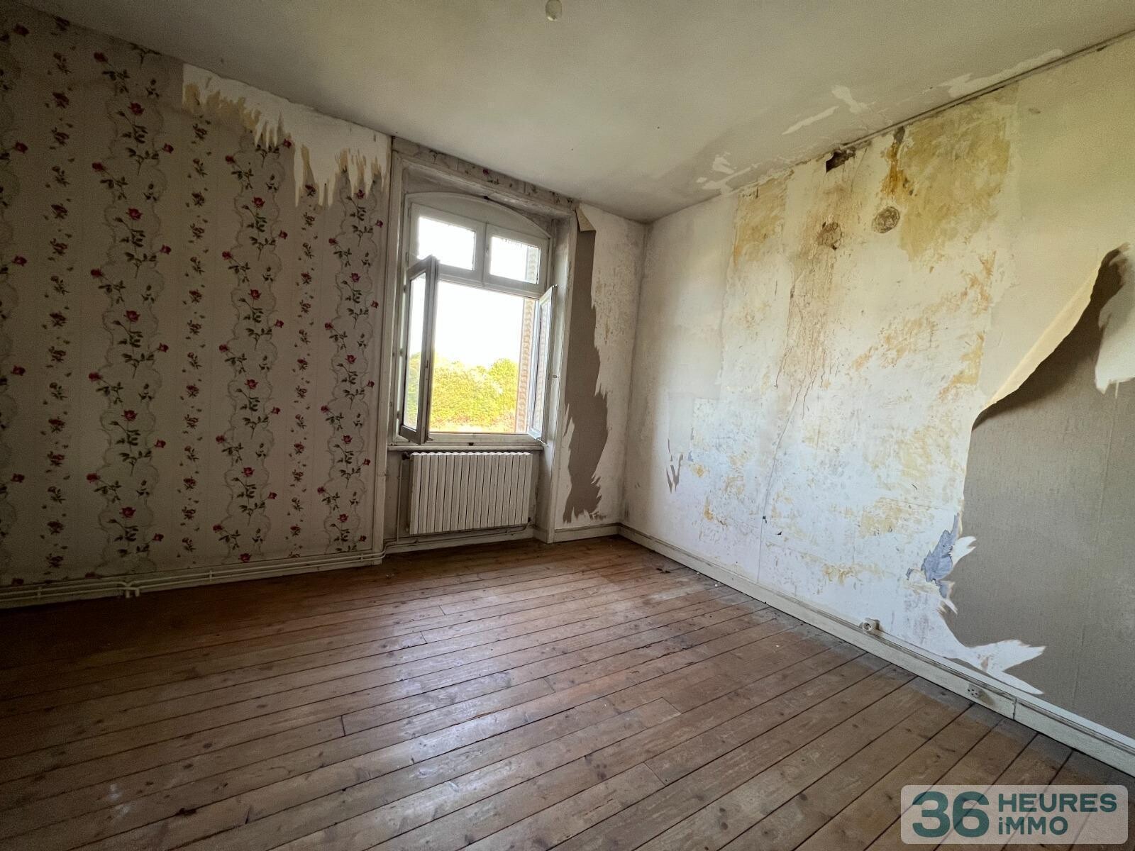 Maison divisée en 3 lots