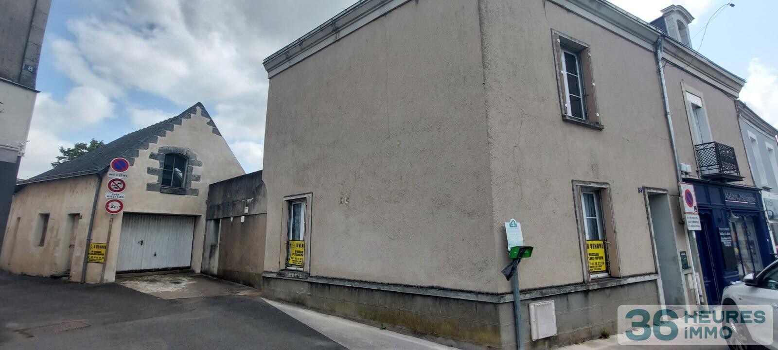 VENTE MAISON DE BOURG AVEC GRAND GARAGE ET COUR 