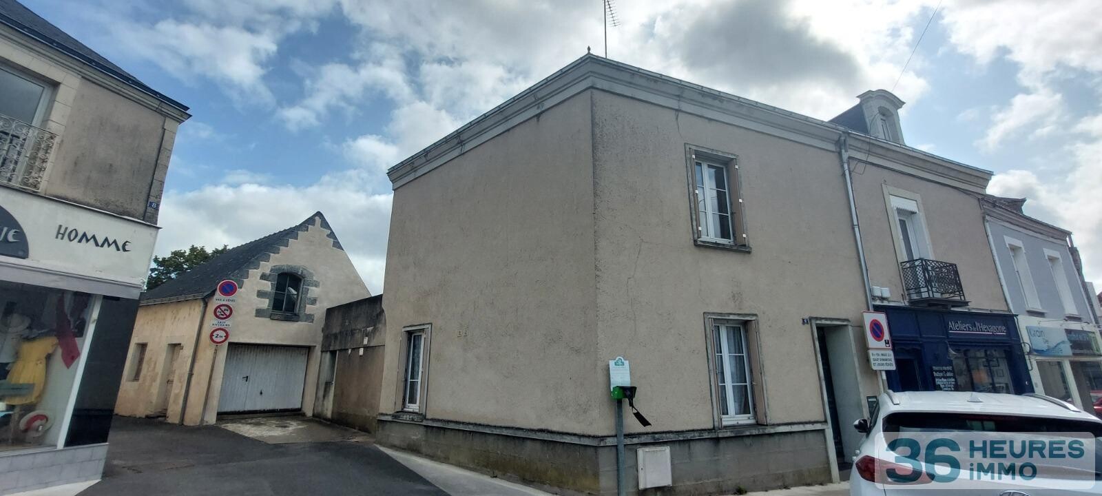 VENTE MAISON DE BOURG AVEC GRAND GARAGE ET COUR 