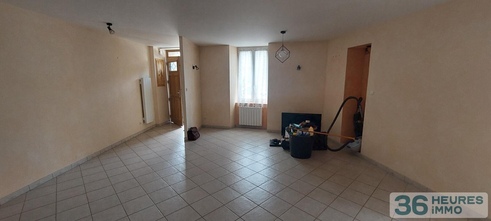 VENTE MAISON DE BOURG AVEC GRAND GARAGE ET COUR 
