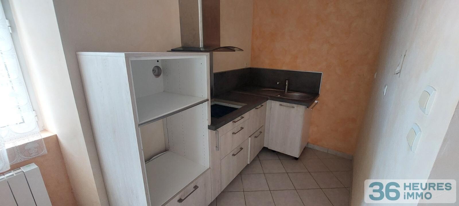 VENTE MAISON DE BOURG AVEC GRAND GARAGE ET COUR 