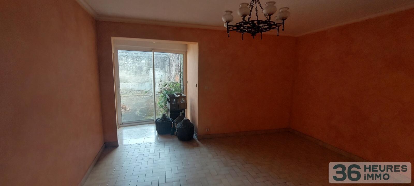 VENTE MAISON DE BOURG AVEC GRAND GARAGE ET COUR 