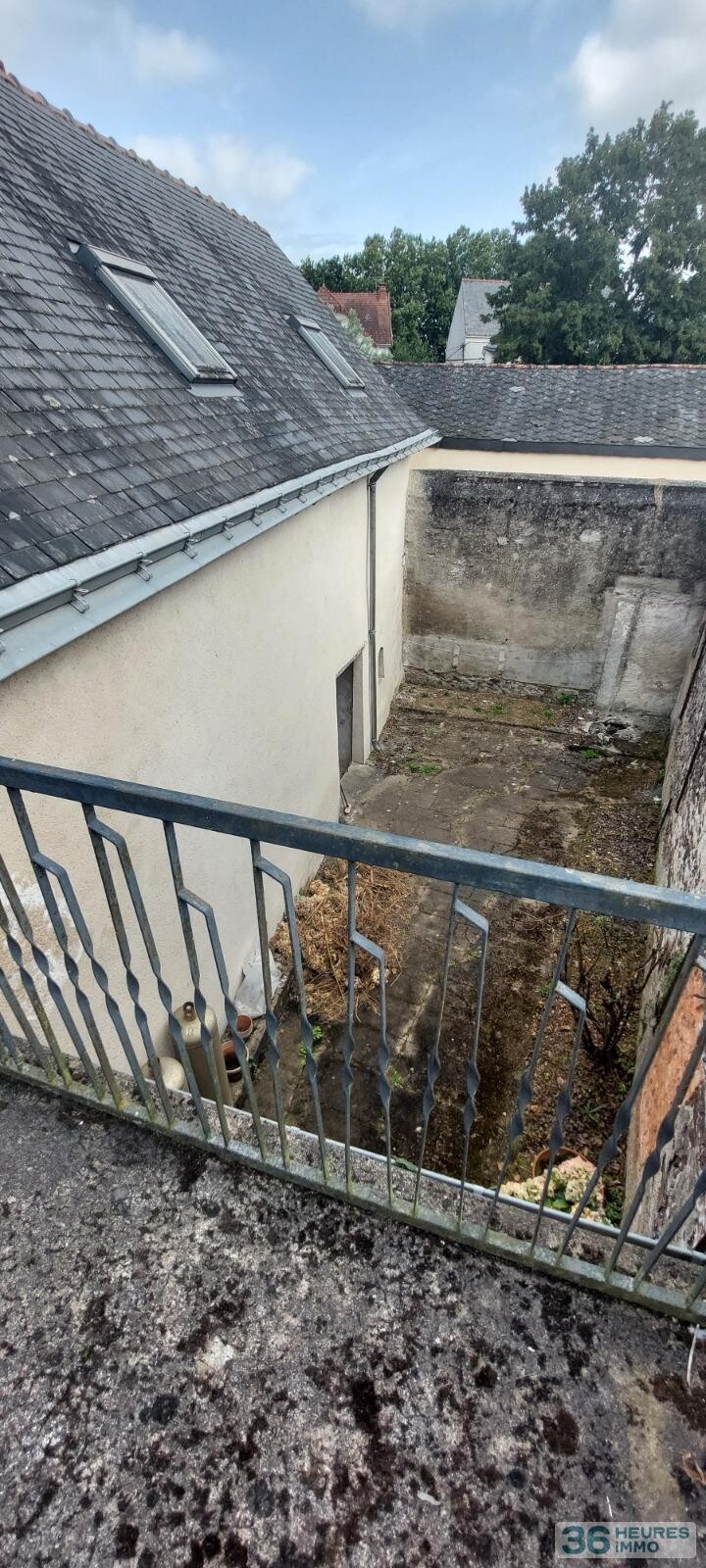 VENTE MAISON DE BOURG AVEC GRAND GARAGE ET COUR 