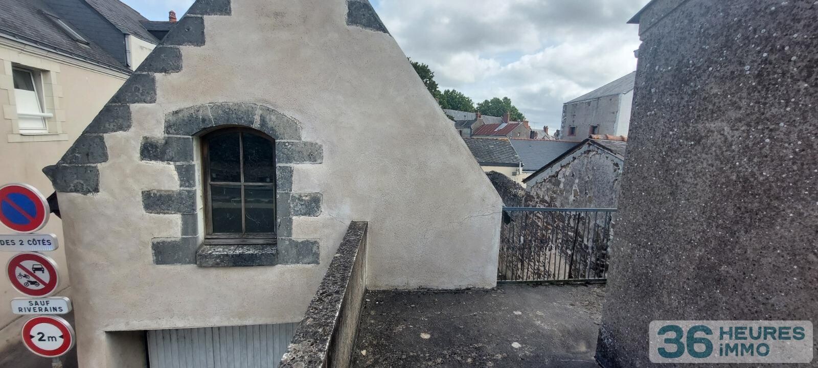 VENTE MAISON DE BOURG AVEC GRAND GARAGE ET COUR 