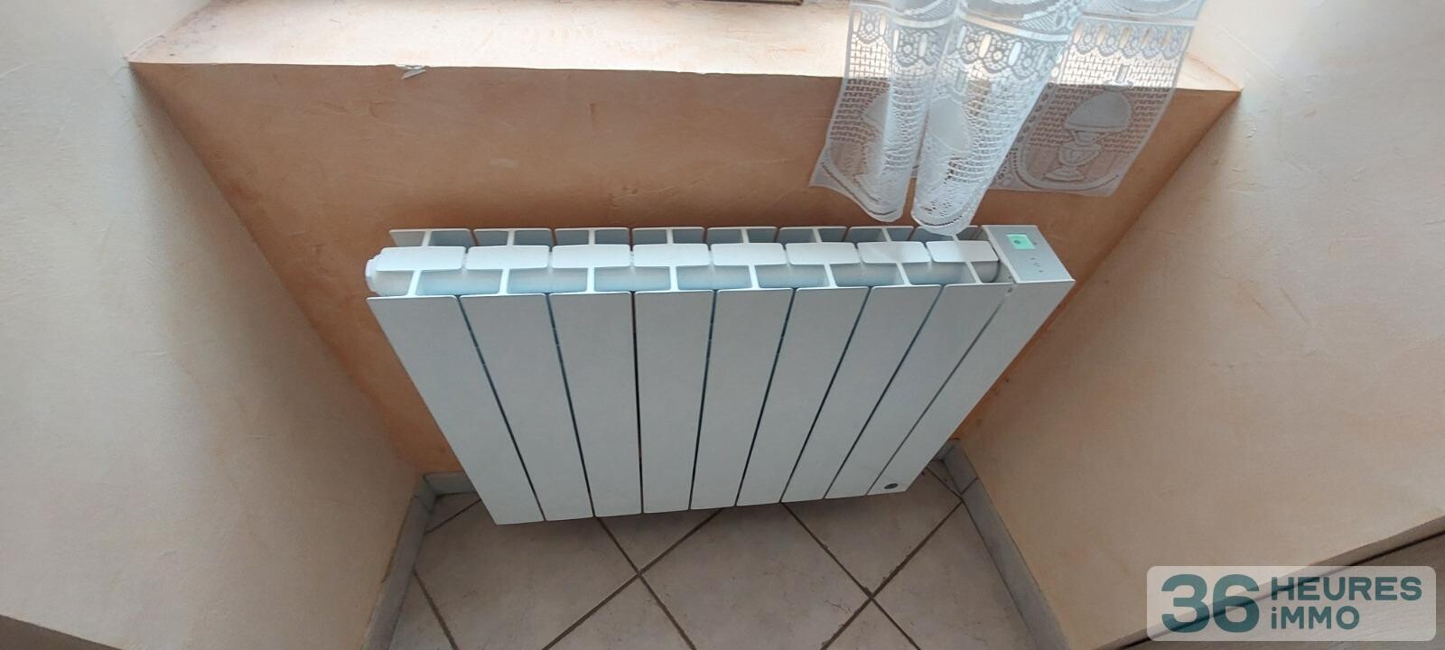 VENTE MAISON DE BOURG AVEC GRAND GARAGE ET COUR 