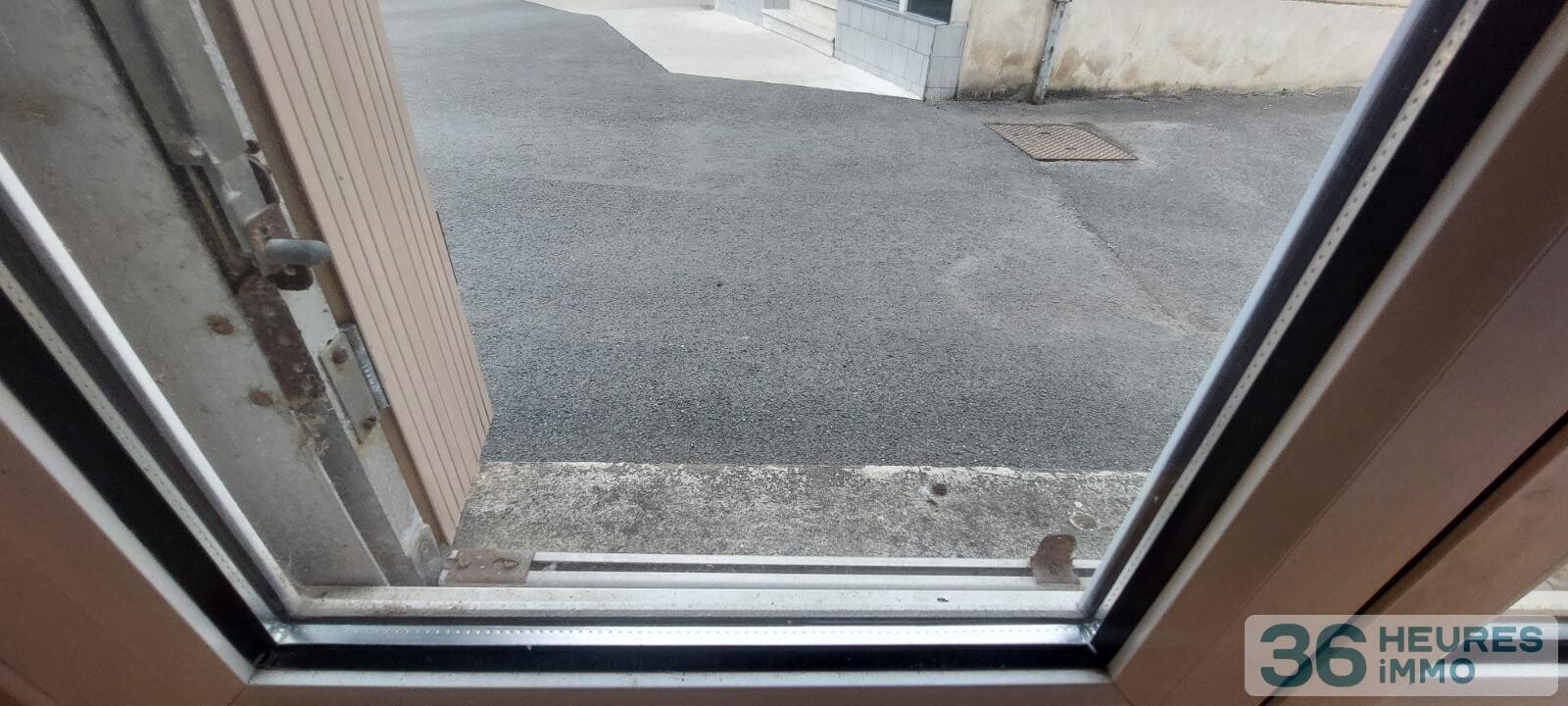 VENTE MAISON DE BOURG AVEC GRAND GARAGE ET COUR 