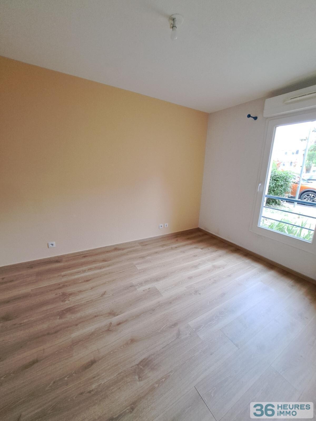 APPARTEMENT 2 CHAMBRES AVEC TERRASSE ET PARKING 