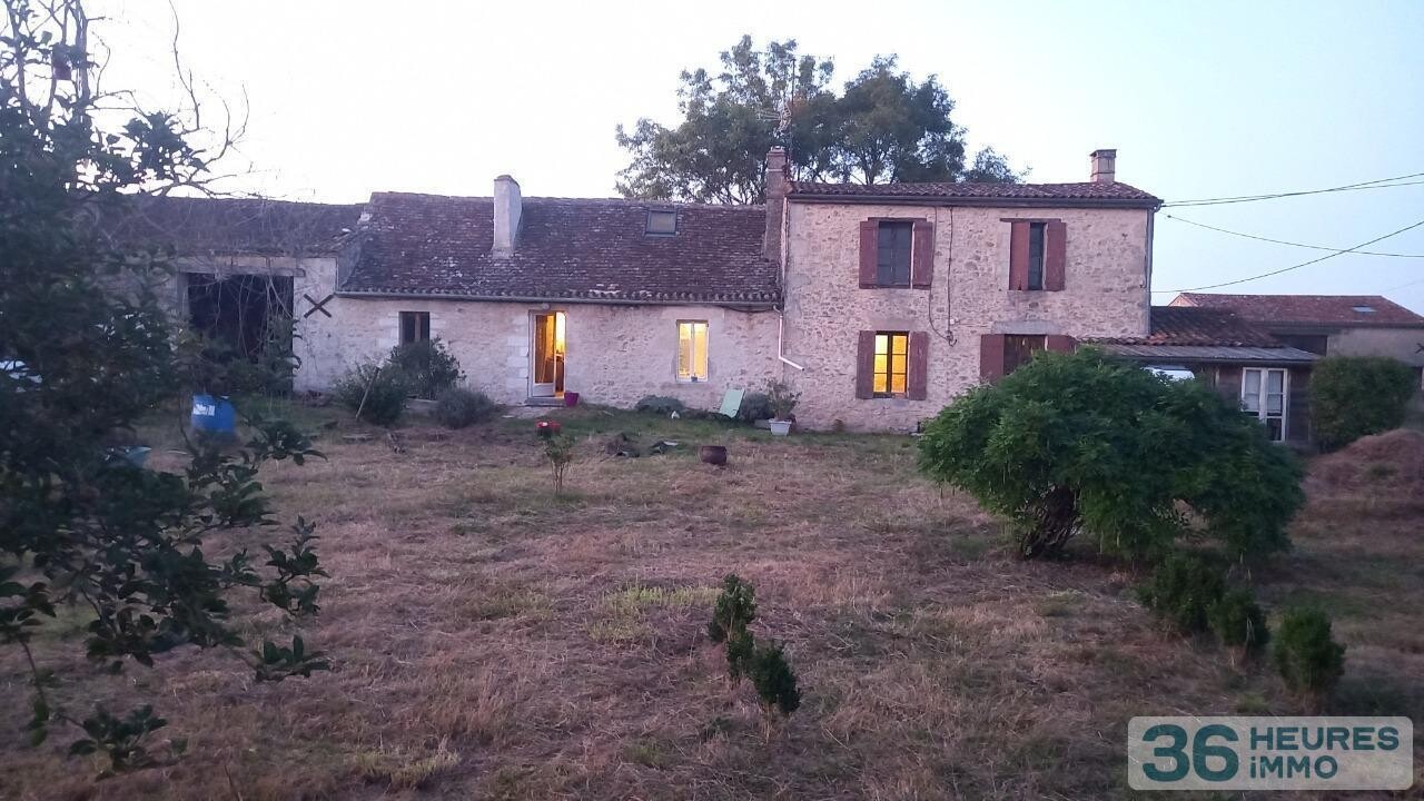 MAISON EN PIERRES AVEC GRANGES