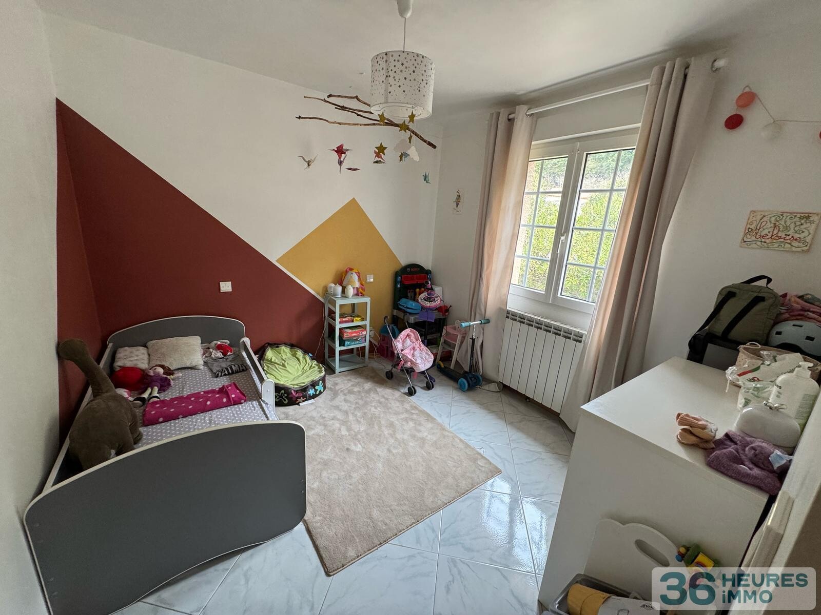 Maison de plain-pied avec beau terrain attenant 