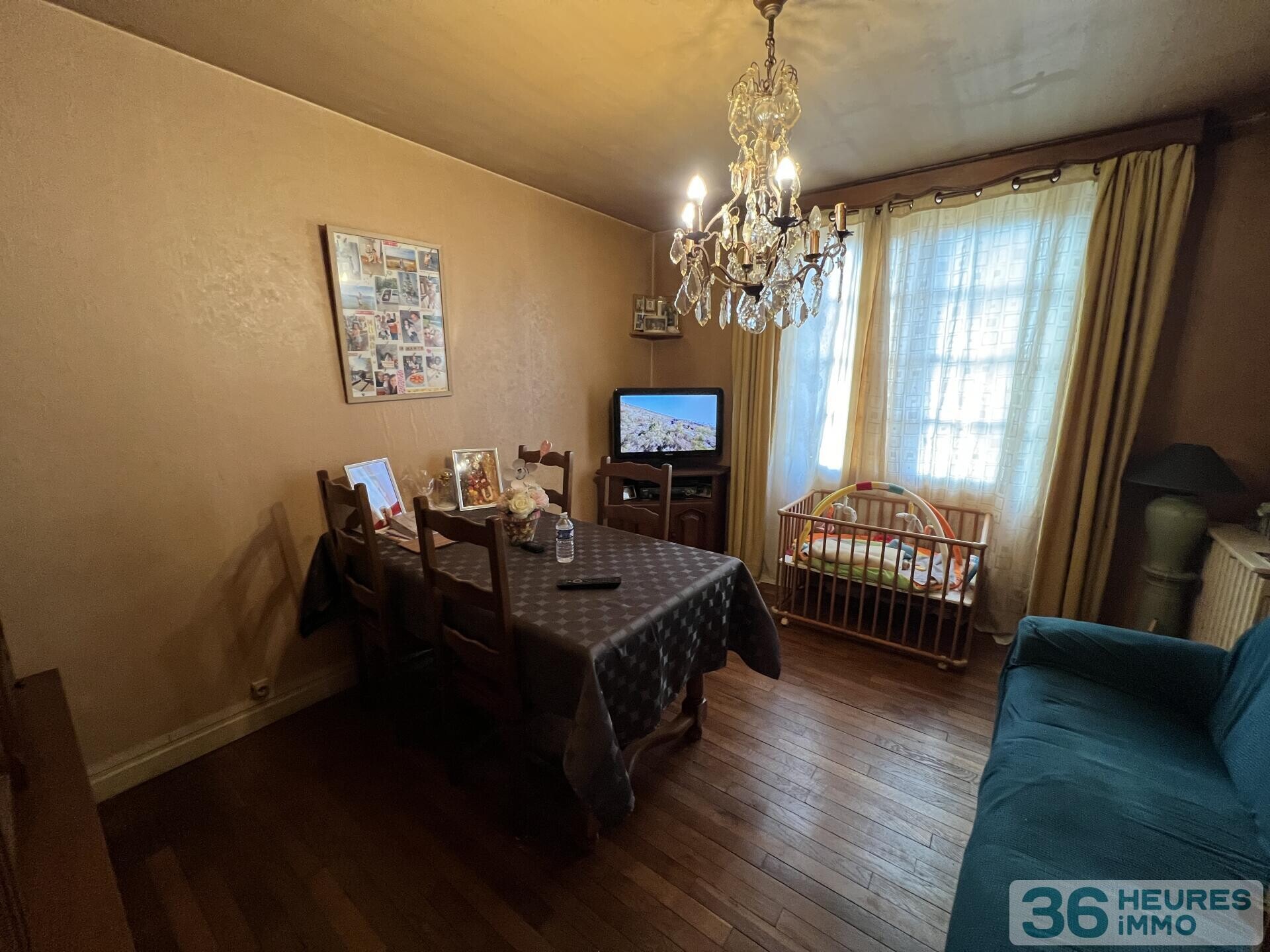 MAISON SUR SOUS SOL AVEC JARDIN