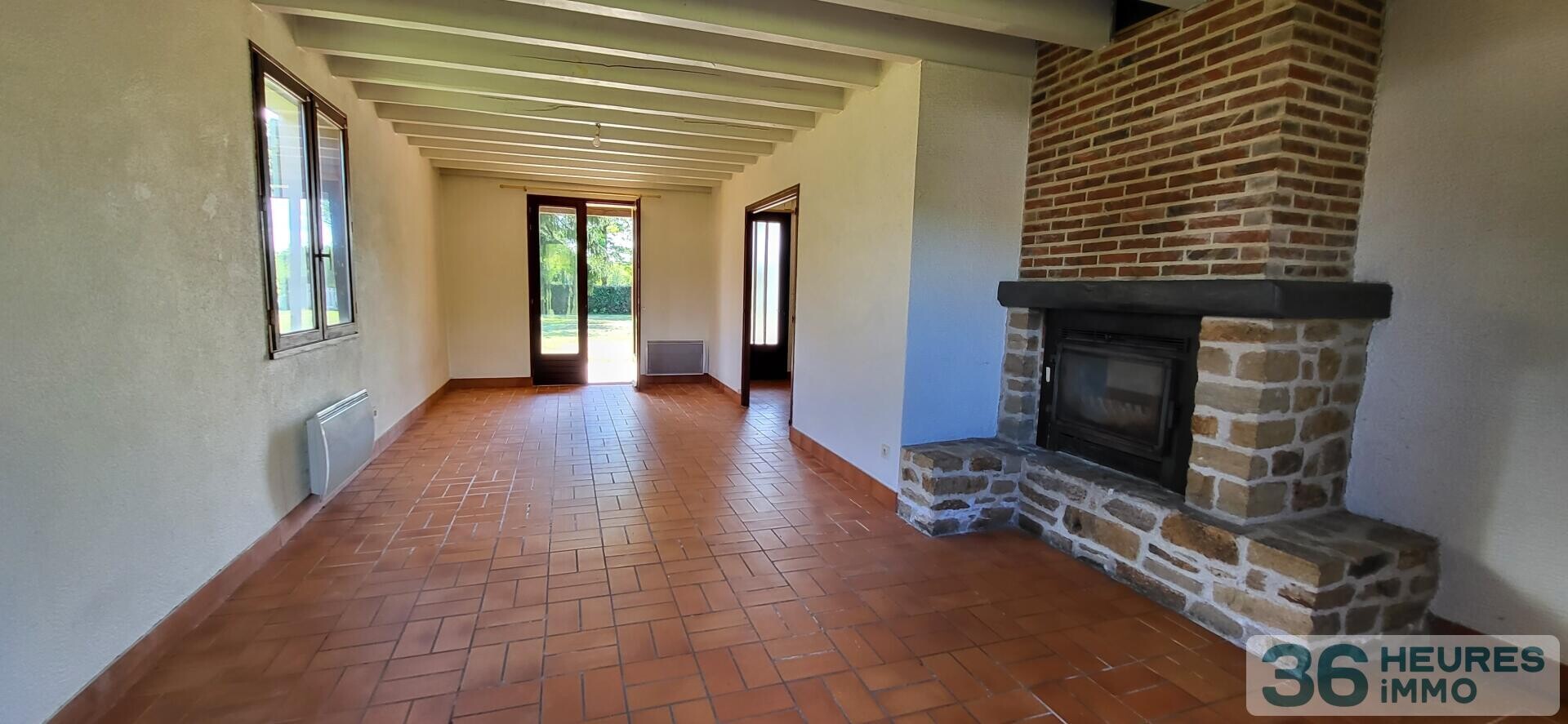 Maison année 80 avec jardin et garage 