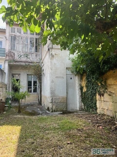 MAISON DE VILLE EN PIERRE AVEC JARDIN