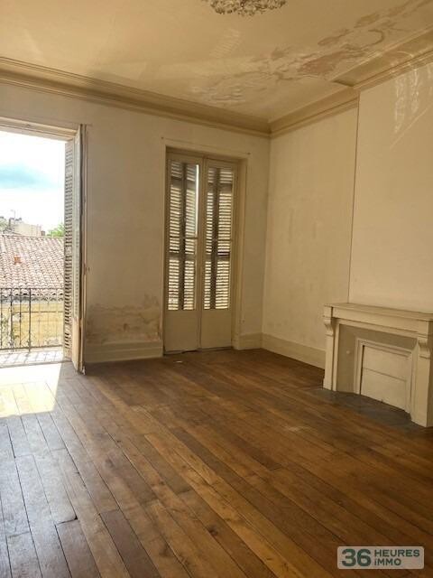 MAISON DE VILLE EN PIERRE AVEC JARDIN