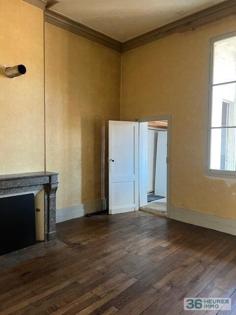 MAISON DE VILLE EN PIERRE AVEC JARDIN