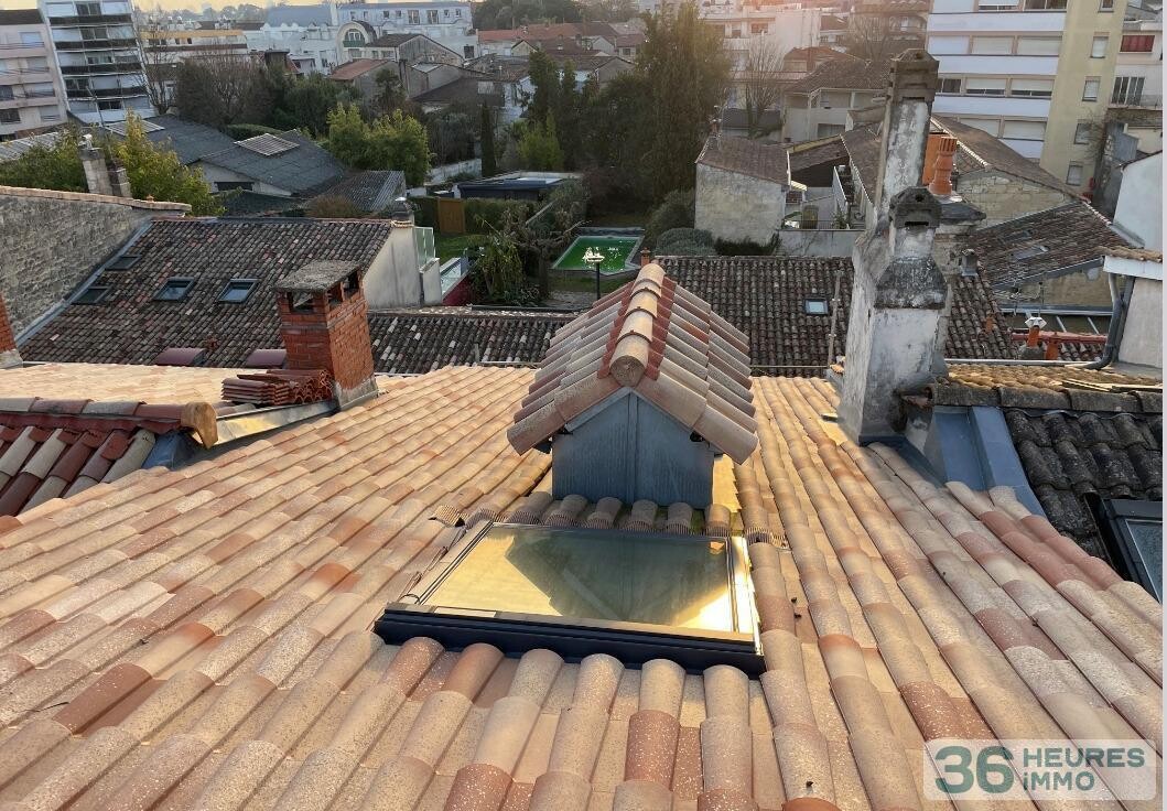 MAISON DE VILLE EN PIERRE AVEC JARDIN