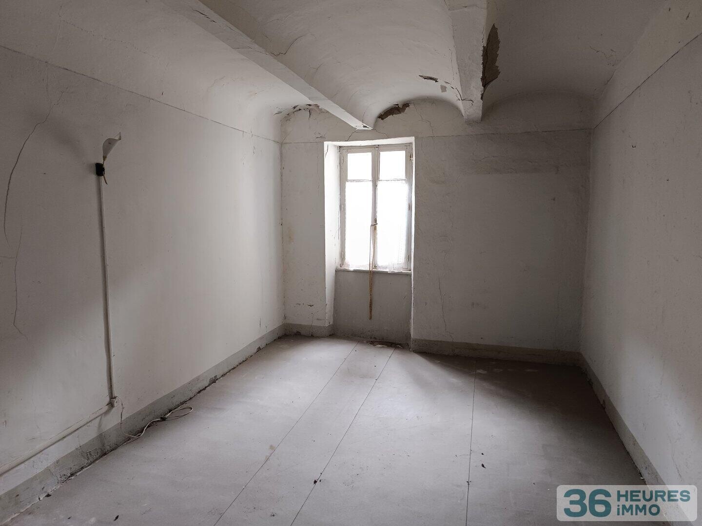 Appartement T3 à rénover intégralement avec jardinet + Terrain de 1460m²