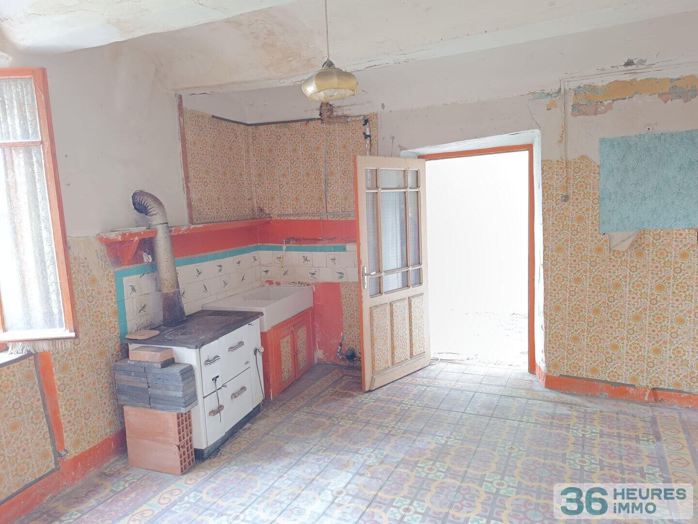 Appartement T3 à rénover intégralement avec jardinet + Terrain de 1460m²