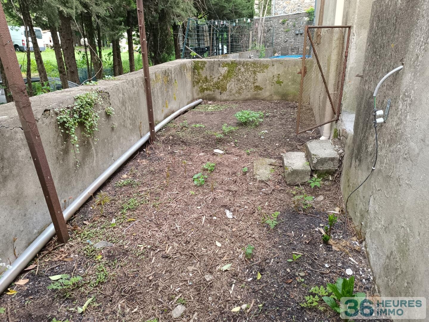 Appartement T3 à rénover intégralement avec jardinet + Terrain de 1460m²