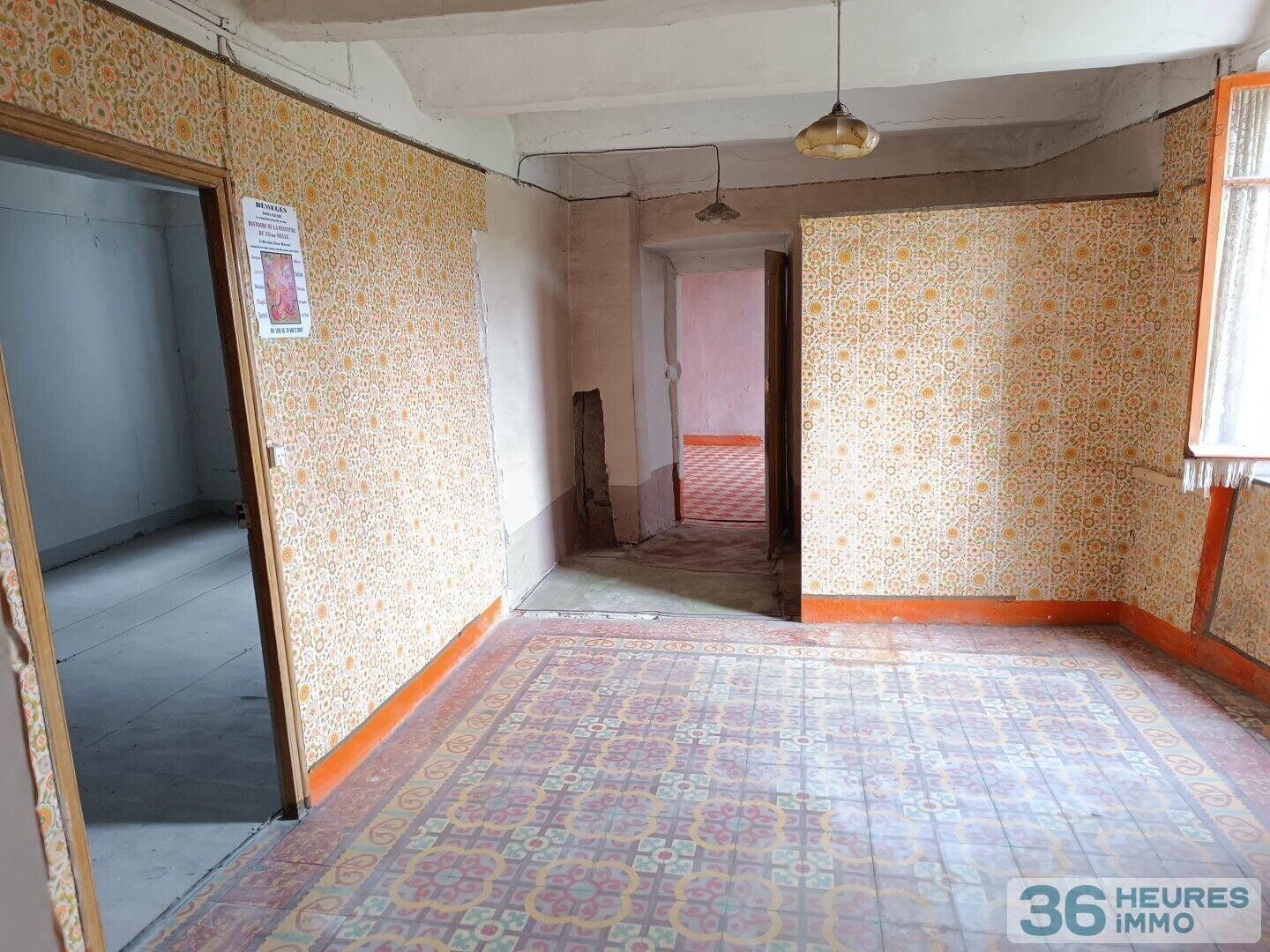 Appartement T3 à rénover intégralement avec jardinet + Terrain de 1460m²