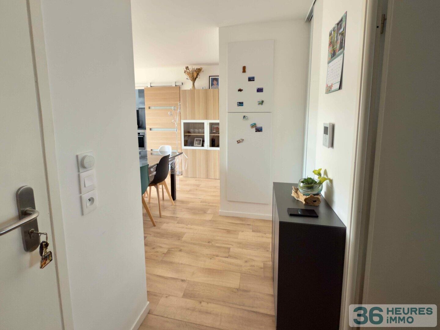 Appartement de 4 pièces avec balcons, cave et 2 parkings