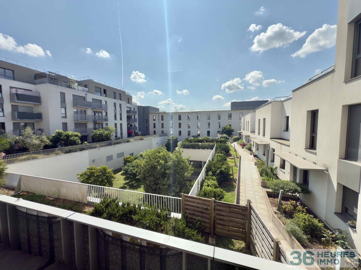 Appartement de 4 pièces avec balcons, cave et 2 parkings