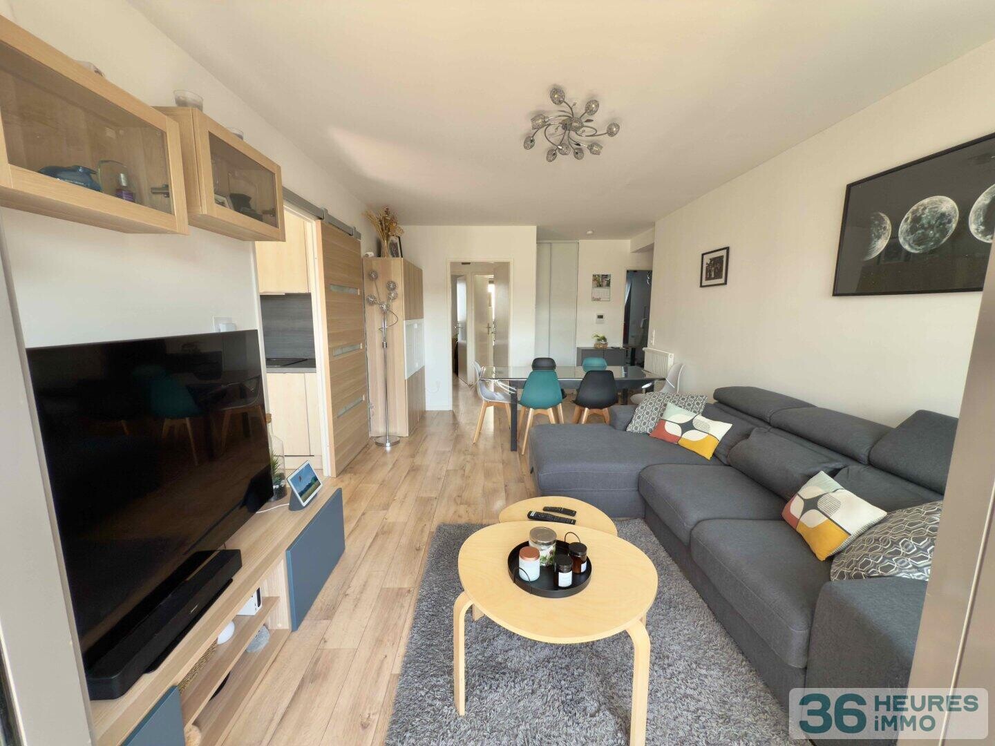 Appartement de 4 pièces avec balcons, cave et 2 parkings