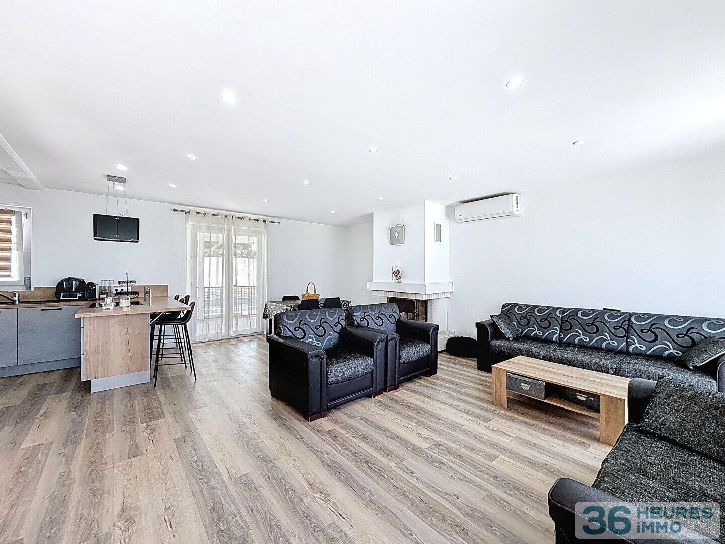 Maison familiale avec piscine et grands volumes à Leyrieu