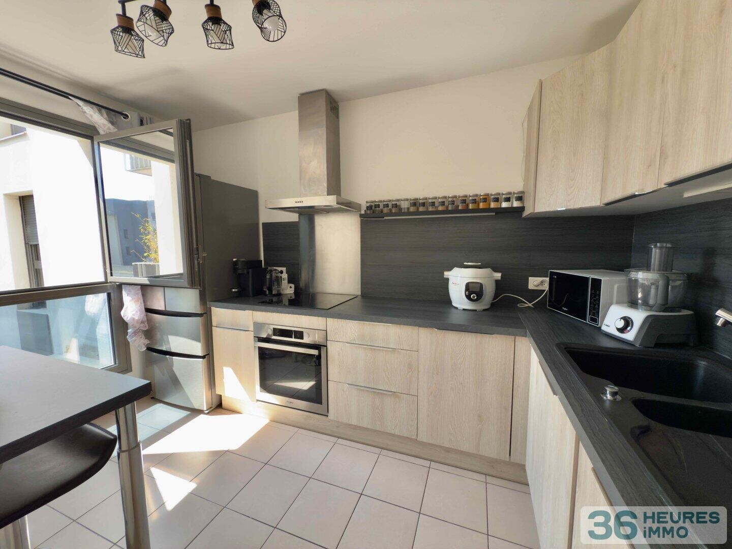 Appartement de 4 pièces avec balcons, cave et 2 parkings