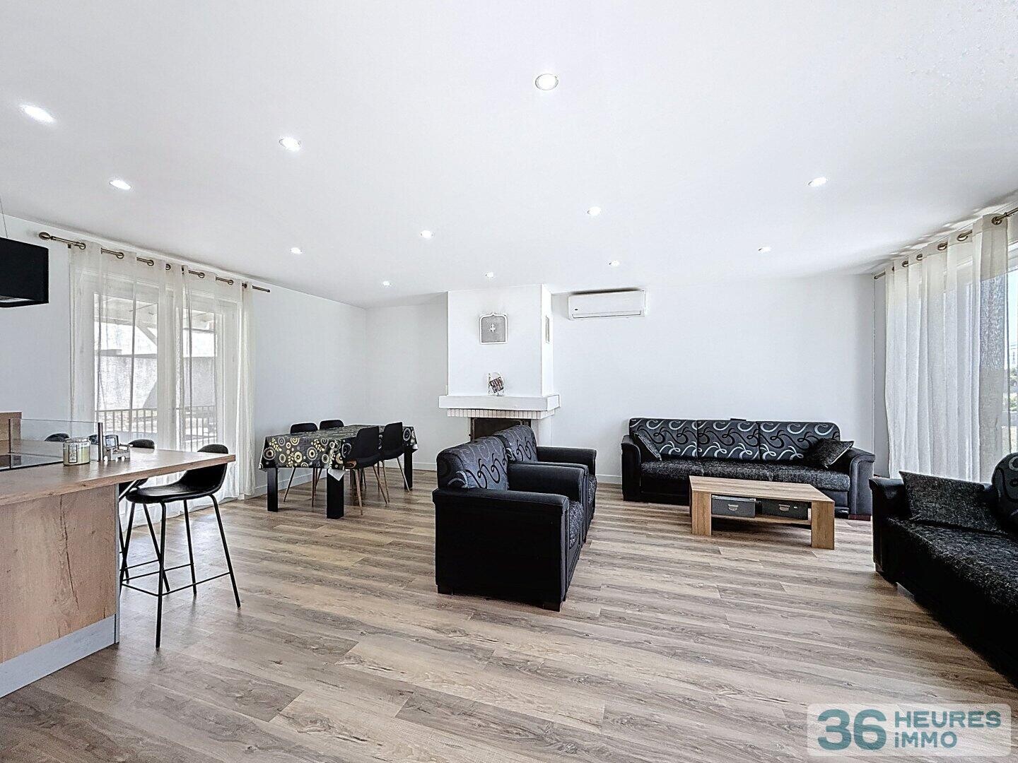 Maison familiale avec piscine et grands volumes à Leyrieu