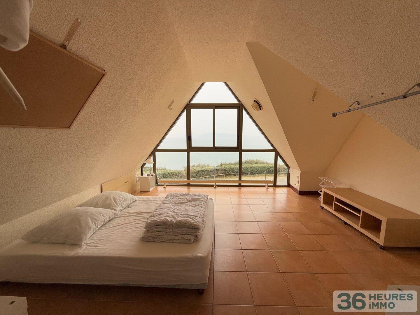 maison avec murs commerciaux 