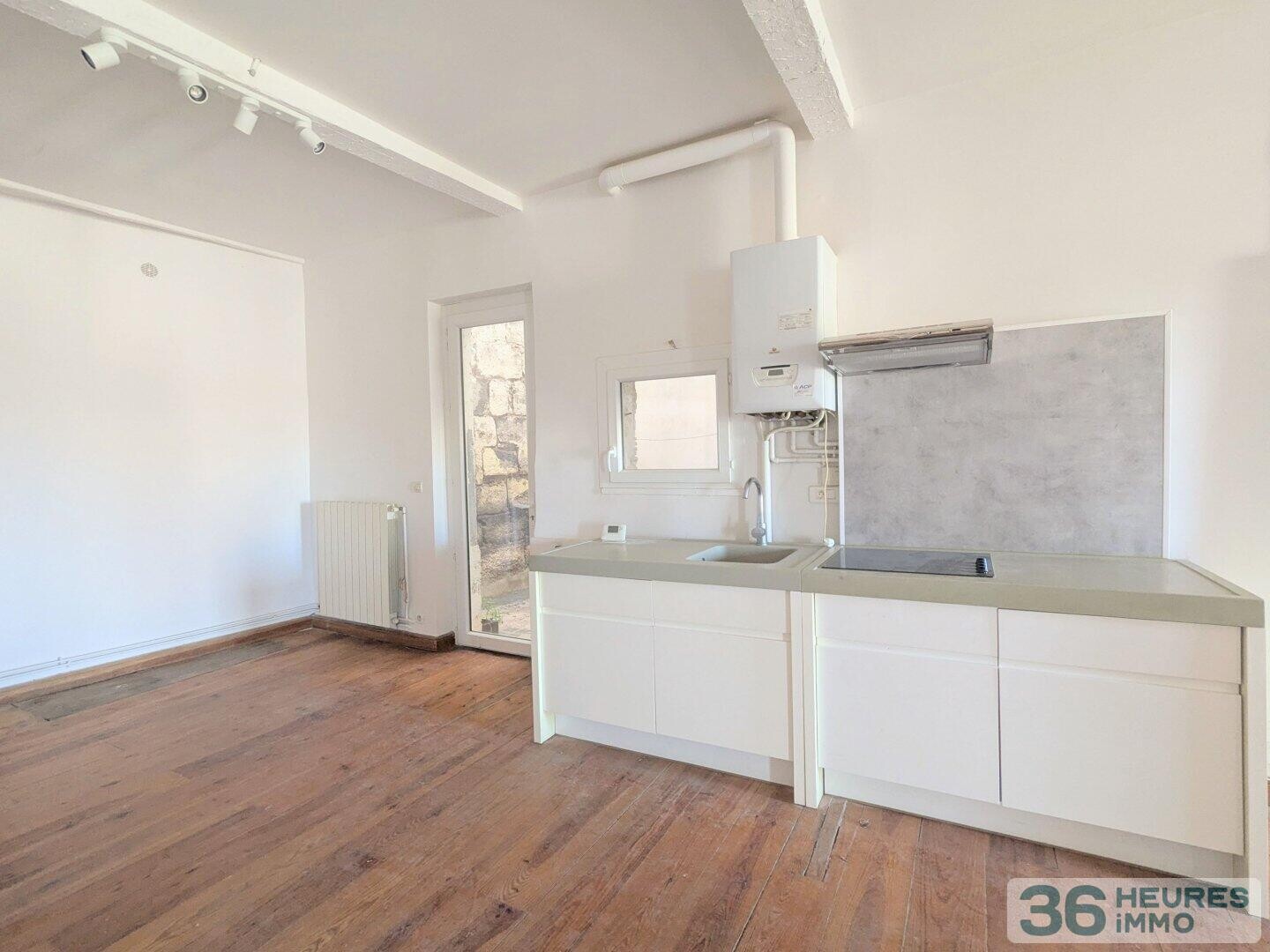 APPARTEMENT LOFT DE 98 M² AVEC COUR