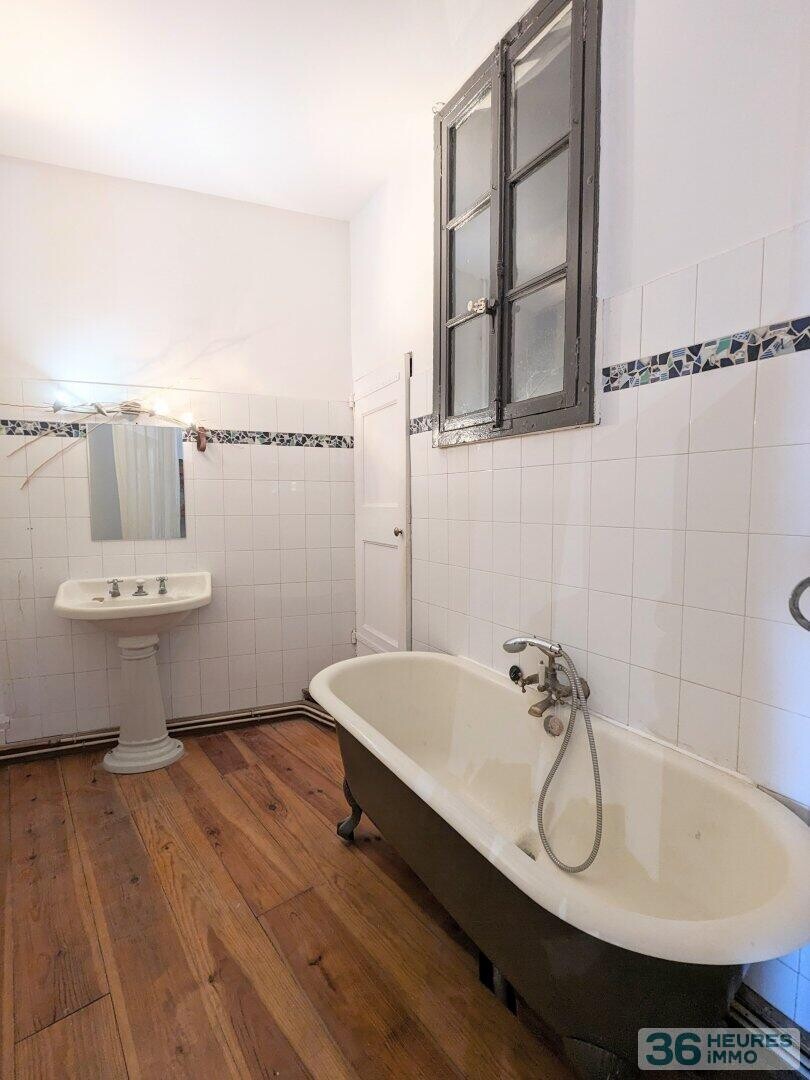 APPARTEMENT LOFT DE 98 M² AVEC COUR