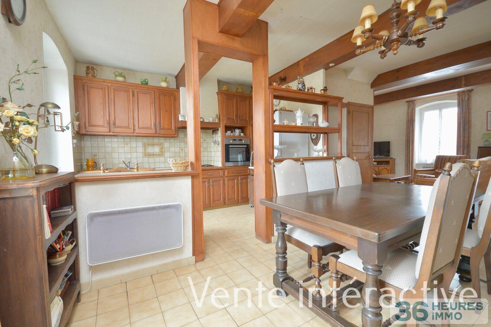 Maison de village avec garage et cour