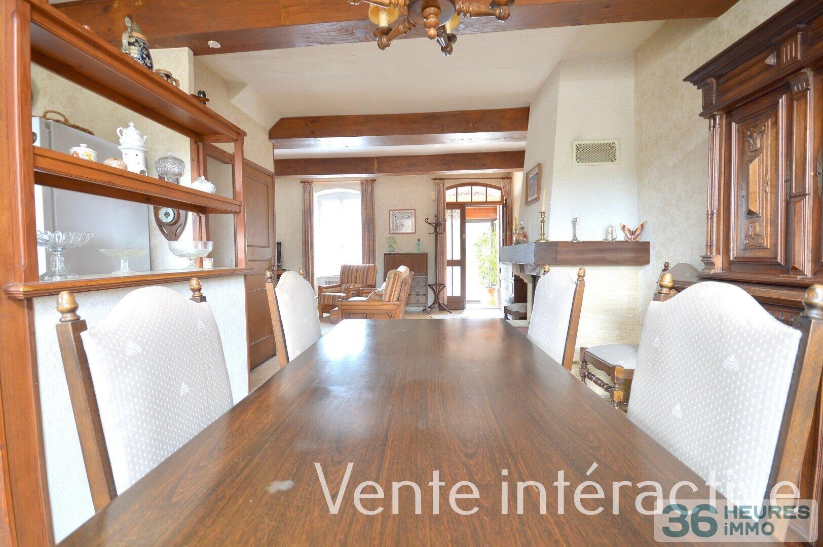 Maison de village avec garage et cour