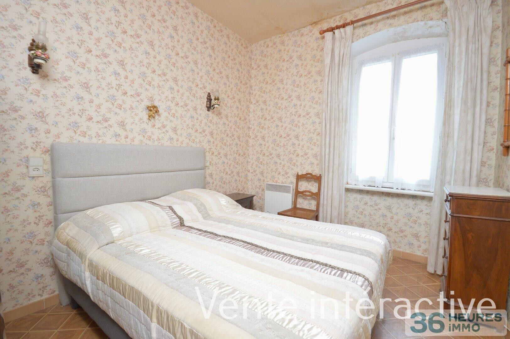 Maison de village avec garage et cour