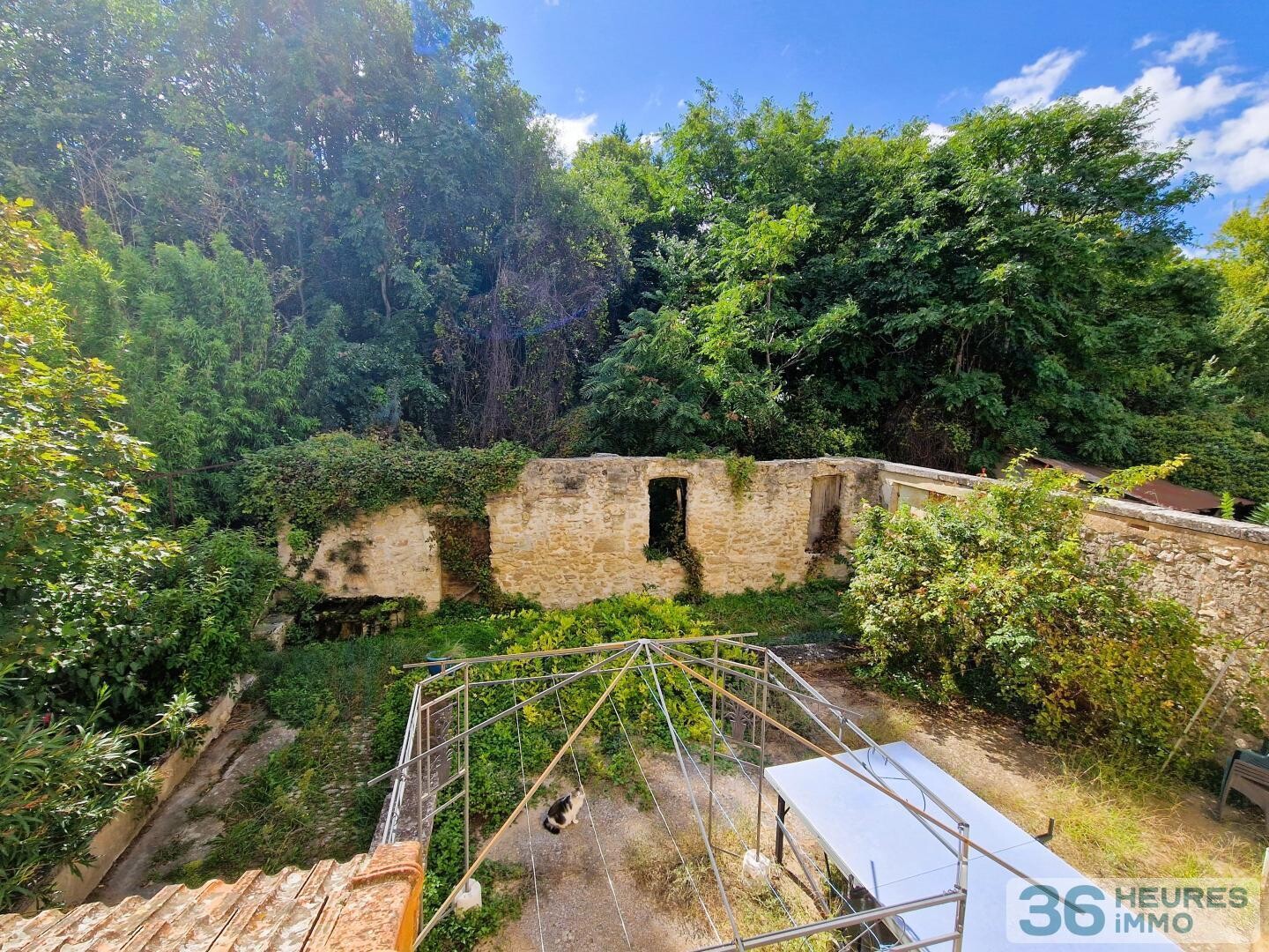 Bastide divisée en 5 appartements et Terrain de 5001m² en Zone UB