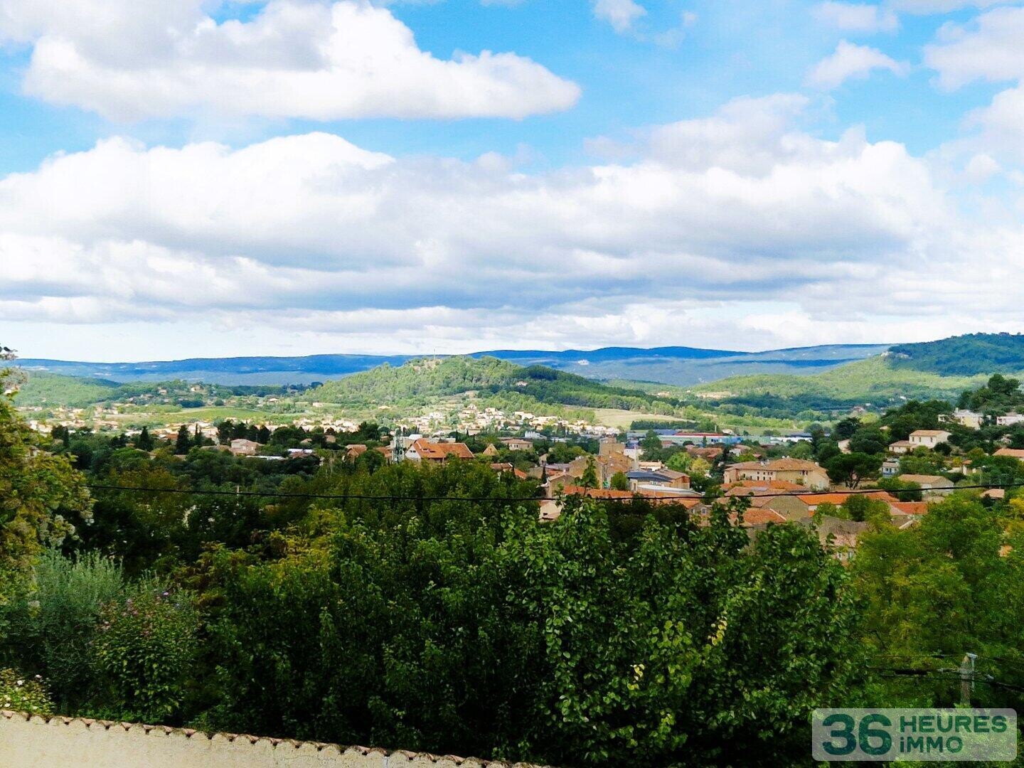 Bastide divisée en 5 appartements et Terrain de 5001m² en Zone UB