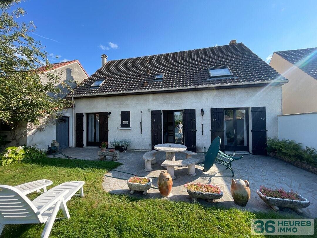 Maison - 9 pièces - 164 m²