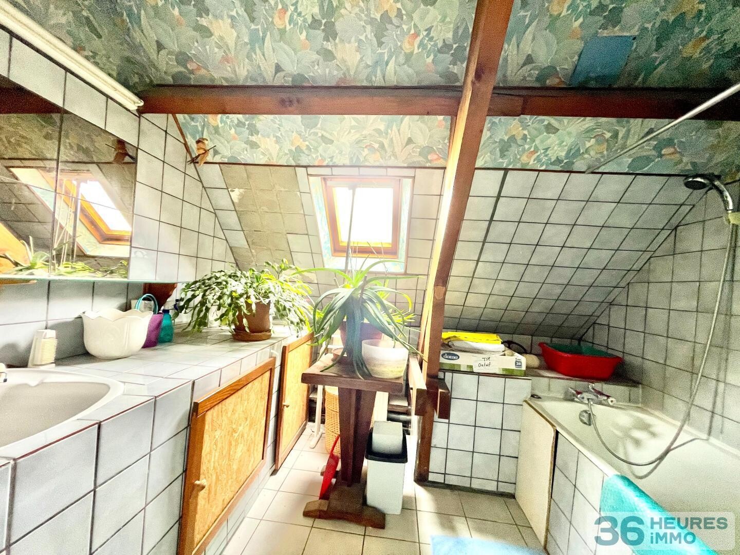 Maison - 9 pièces - 164 m²