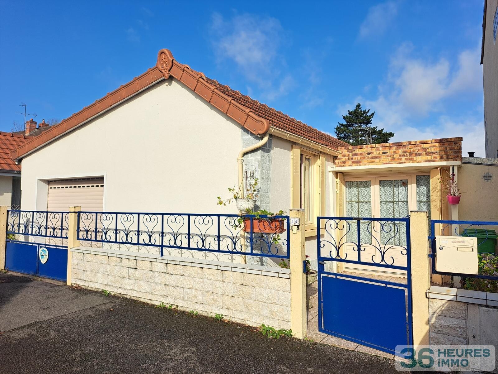 PLAIN PIED AVEC GARAGE ET JARDIN 